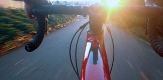 biking at sunrise or sunset from handlebars