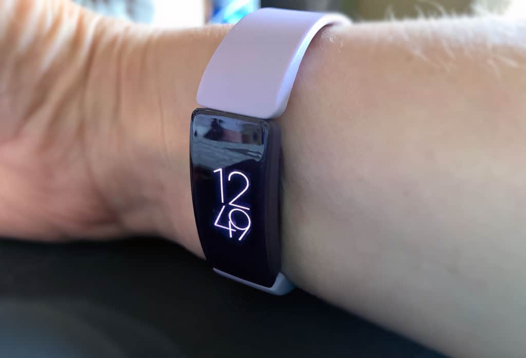 place fitbit on inside of wrist and arm