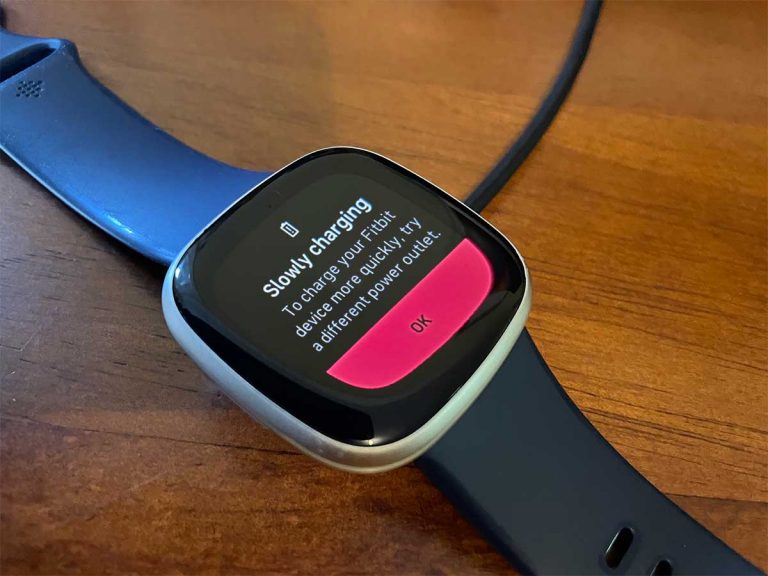 Seeing a message that your Fitbit is charging slowly? Learn what to do